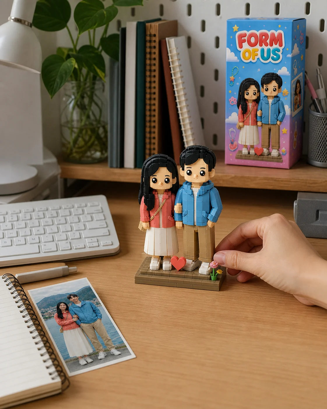 A personalized couple building-block figure on a home desk
